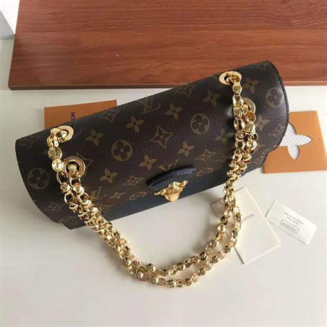 lv chain ring|Lv small bag with chain.